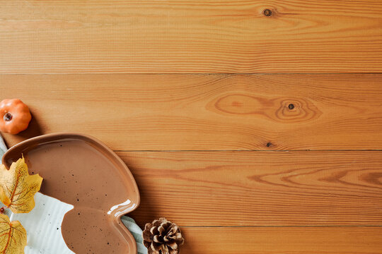 Autumn table background with mushroom plate and copy space