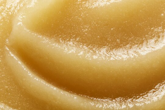 Close up view of smooth texture of a food item in bright light at a kitchen setting