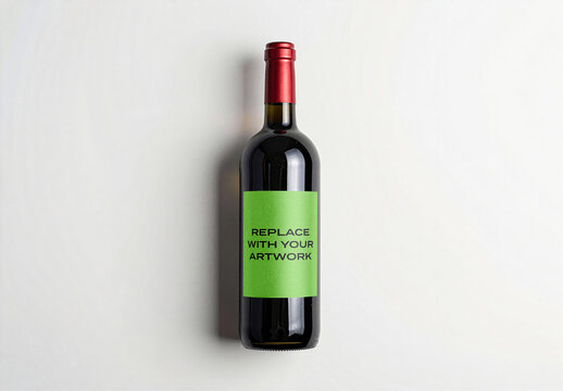 Wine bottle mockup with label template on white background, vertical product presentation for branding and packaging design, realistic display featuring red foil cap