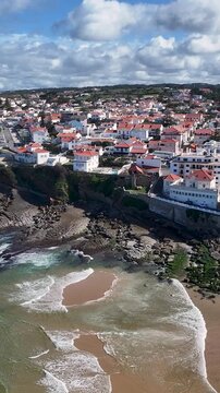 Macas Beach In Sintra District Of Lisbon Portugal. Turquoise Ocean Waves Gently Crashing On Tropical Beach. Bay Water Landscape. Landmark Coast. Sintra District of Lisbon.