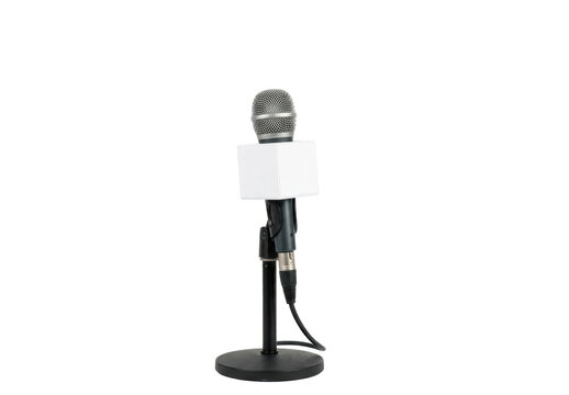 Professional studio microphone on stand with white cube, ready for broadcasting, interviews, public speaking, and recording audio.