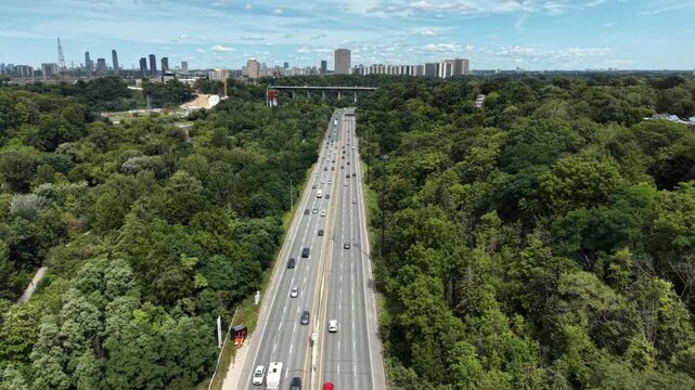 Aerial view of the Don Valley Parkway winding through Toronto