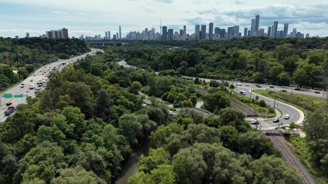 Aerial view of the Don Valley Parkway and Don River, Toronto skyline