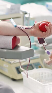 Volunteer donating blood in a transfusion center