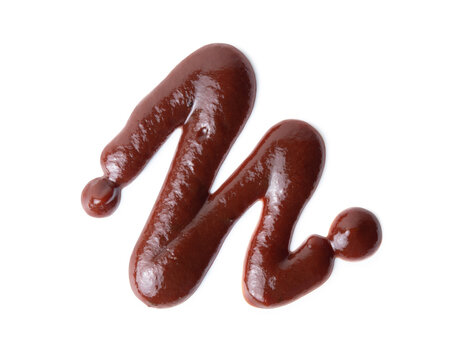 Squeezed barbecue ketchup isolated on white background close-up
