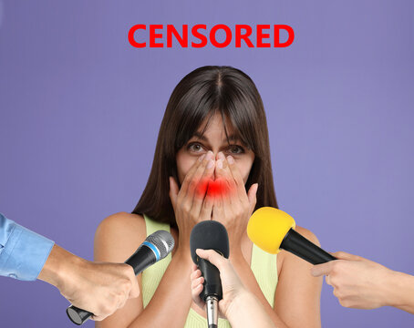 Embarrassed woman covering her mouth with hands during interview with journalists on pale purple background. Censored speech