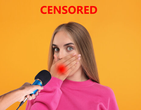 Embarrassed woman covering her mouth with hand during interview with journalist on orange background. Censored speech
