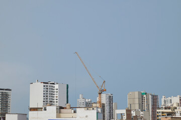 Urban skyline with construction crane building new apartment towers © JF:Carpio