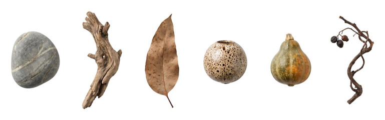 Fototapeta premium Curated collection of natural and handmade objects including a stone, driftwood, leaf, ceramic vase, gourd, and twig arranged in a horizontal line for a wabi-sabi concept