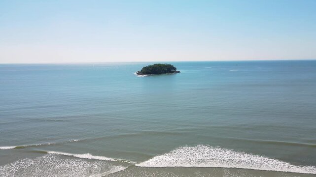 Balneario Camboriu small island in ocean aerial view ilha das cabras