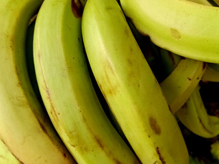 Close Up of Fresh Raw Green Bananas © Grafisqueen