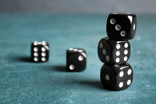 Black dices on color background