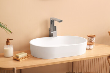 Fototapeta premium Modern bathroom design and home decor, white ceramic sink with chrome faucet on wooden counter, minimalist interior