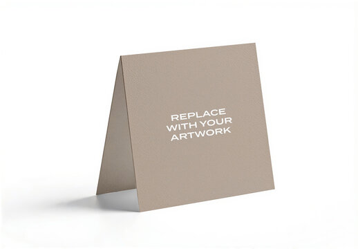 Leather tent card mockup standing upright on a white surface with placeholder text, clean studio background, vertical orientation, graphic design template for branding, print display