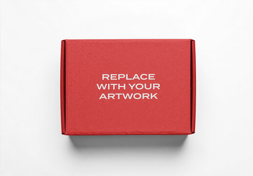 Cardboard box mockup with replace your artwork text on a white surface, top view packaging presentation, product template for branding, commercial display, e-commerce, shipping, container, label
