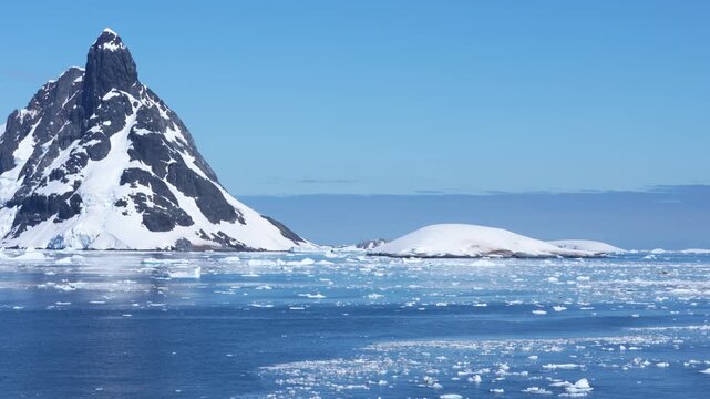 Antarctica Bismark Strait Epic Landscape, Icebergs, Ice, Mountains Covered in Snow, Glaciers. Wide Vista Beautiful View From Cruise Ship Day.