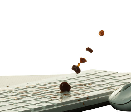 Morning Coffee spill on keyboard mouse and splashing around. Black Coffee drink accident fall spill all over keyboard computer. White background isolated element