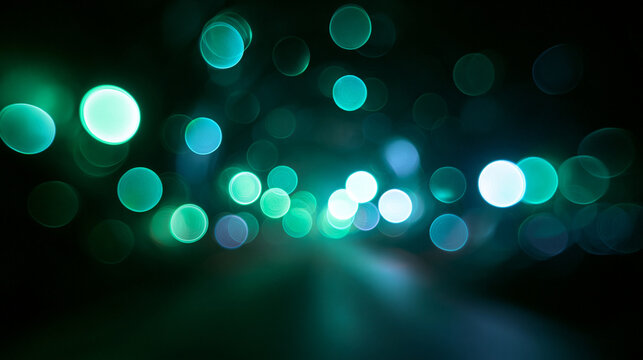 Abstract Glowing Teal Bokeh Lights on Dark Background