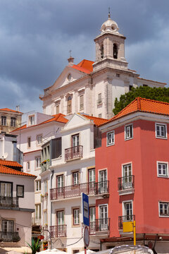 Colorful Historic Houses and Church Tower in Lisbon, Portugal