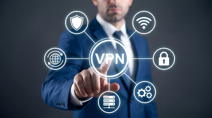 Obraz premium Businessman touching VPN button on virtual screen with cybersecurity icons for internet safety