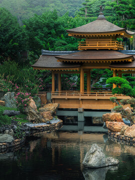 Scenic Tang Dynasty style wooden pavilion built over a koi pond with rockeries in Nan Lian Garden