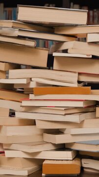 Books Pile Build Stop Motion Loop in Library vertical video