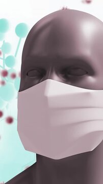 Digital human head with mask and virus models illustrates COVID-19 concept.