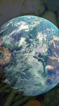 Animation of spinning globe over table of vegetable