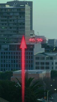 Animation of financial data processing with arrows over cityscape