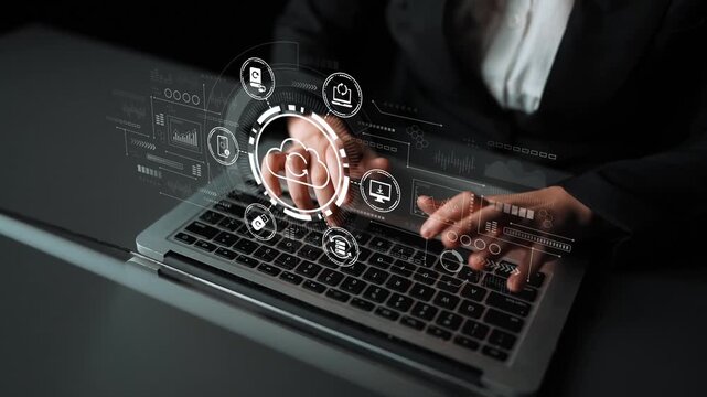 Business professional working on laptop with futuristic cloud computing interface and data analytics symbols for digital transformation concept. Entropy.