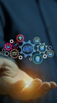 Businessman open hand vertical shot supporting glowing gear wheel mechanism with SEO central text and icons. Search engine optimization, digital ranking strategy, and website traffic concept.