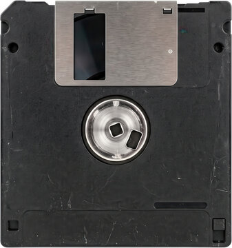 Old black floppy disk closeup showing vintage data storage technology with metallic shutter slider and magnetic hub center in retro computer hardware design diskette media