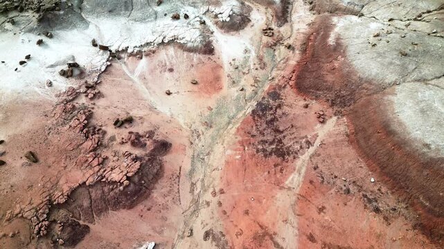 Aerial view of desert landscape in Utah, drone over colorful sandstone hill tops. Travel and landscape footage