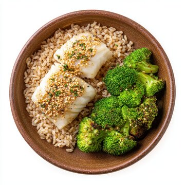 Healthy lunch menu with brown rice steamed cod roasted broccoli isolated on a white background