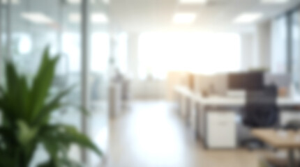Blurred modern open plan office interior with desks and chairs.