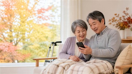 Fototapeta premium スマートフォンの写真を共有するシニア夫婦