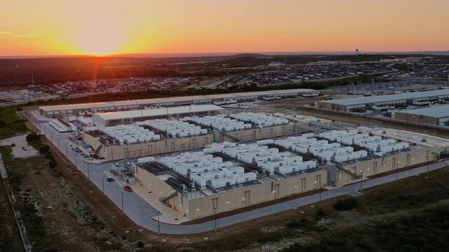 Aerial Reveal of Large Data Center Rooftop Infrastructure at Sunset. San Antonio Texas	
