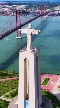 King Christ In Almada District Of Lisbon Portugal. Aerial View Of A Bustling City With High-Rise Buildings And Traffic. Downtown Cityscape. Urban Backgrounds. Almada District of Lisbon.