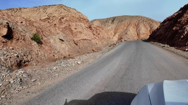 Driving through the colorful badlands of ALTASHI Geopark, Xinjiang