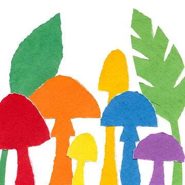 Vibrant abstract arrangement of torn paper mushrooms and leaves, creating a whimsical forest scene.