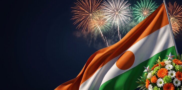 Waving flag of niger with horizontal orange, white, and green stripes and a central orange circle, set against a dark night sky with colorful exploding fireworks and a floral bouquet