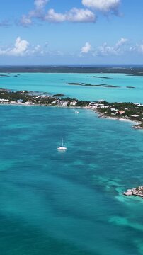 Sapodilla Bay Beach In Providenciales Turks And Caicos England. Aerial View Of Stunning Beach With Crystal Clear Waters. Bay Water Landscape. Landmark Seaside. Providenciales Turks and Caicos.