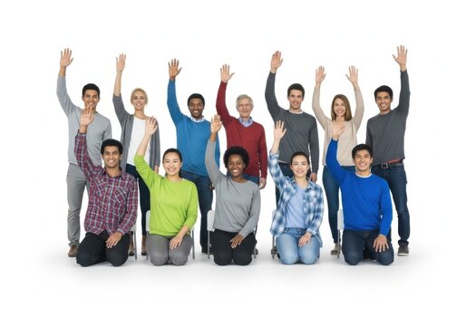 Diverse group of people raising hands together