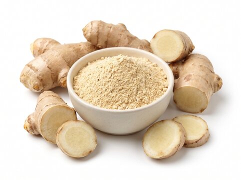 Fresh ginger root with sliced pieces and ground ginger powder in a ceramic bowl isolated on white background, healthy spice and herbal medicine ingredient