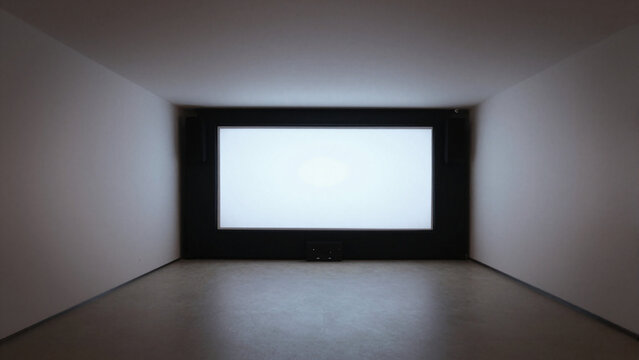 Minimalist gallery room projection screen glowing in a dark wall inset