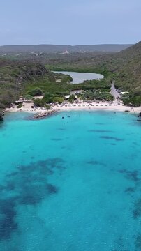 Daaibooi Beach In Willemstad Netherlands Curacao. Turquoise Ocean Waves Gently Crashing On Tropical Beach. Tropical Skyline. Summer Backgrounds. Willemstad Netherlands.
