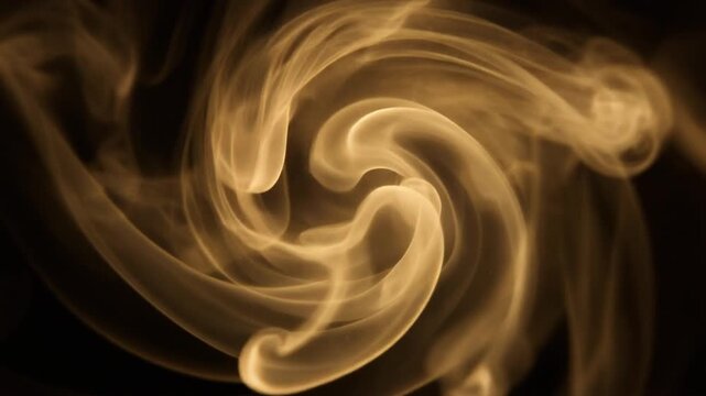 Luminous champagne-gold smoke spirals slowly through complete darkness, delicate vapor layers curling and expanding with embedded glowing particles &mdash; ideal for luxury fragrance and premium overlays.