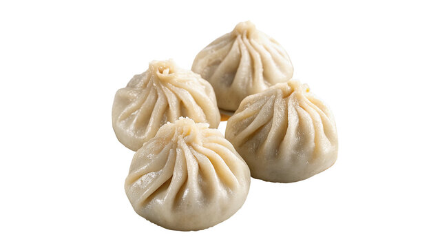 Heap of delicious fresh cooked dumplings khinkali manti isolated on a white background
