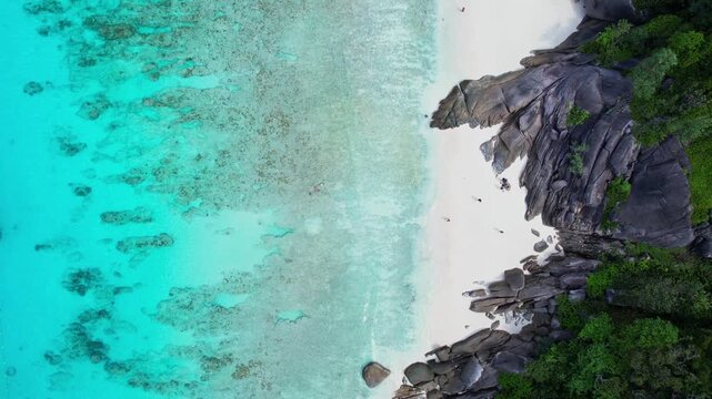 Nature of the ocean and blue sky Summer with sunshine, sandy beaches, clear blue waters sparkling against the blue sky. on an island with good ecology and environment Background for summer vacation