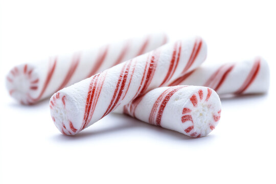 Delicious peppermint candies with a classic red and white swirl pattern, perfect for festive occasions and sweet treats.